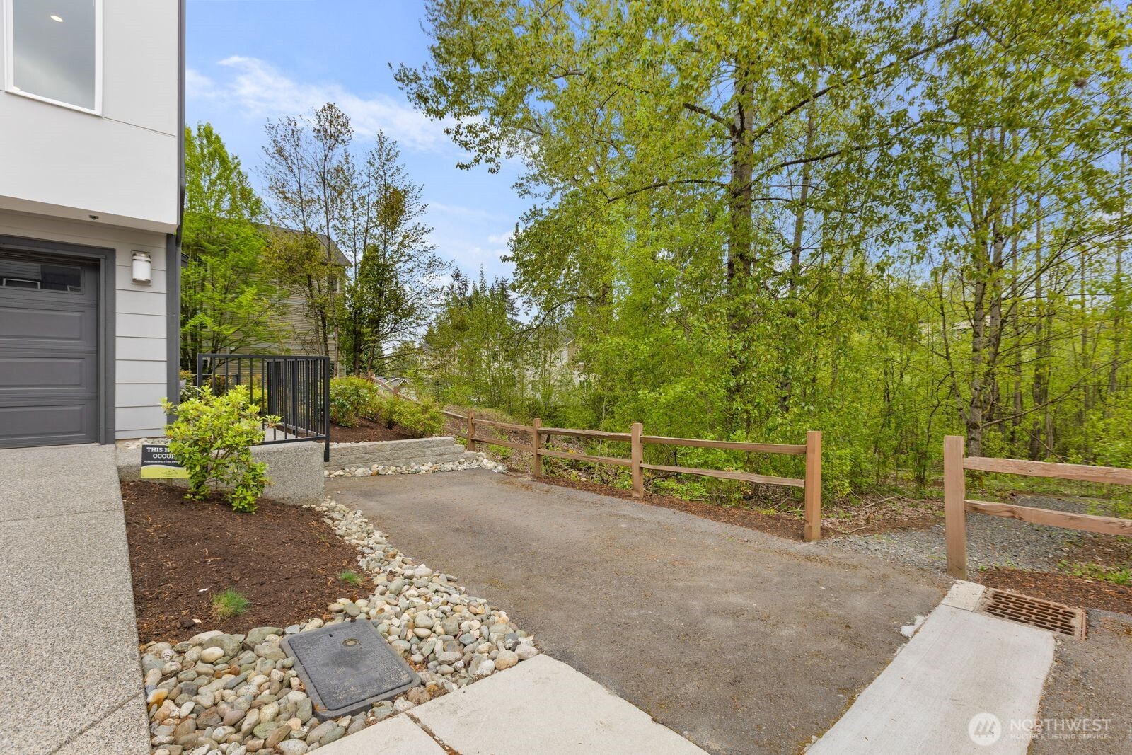 826 238th Place Southeast, Unit F Bothell, WA 98021 - Photo 35 of 39 a backyard of a house with lots of green space