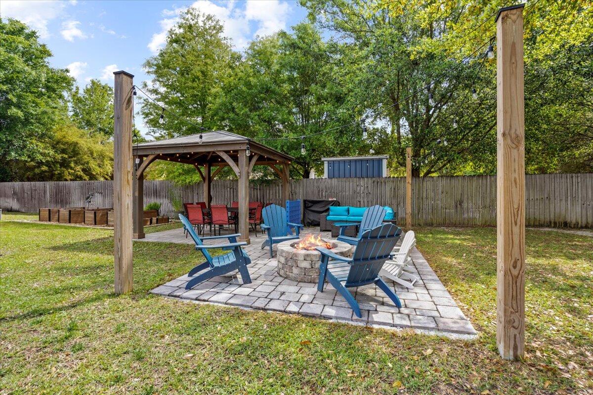 8187 Beleza Street Navarre, FL 32566 - Photo 1 of 50 Patio/Fire Pit