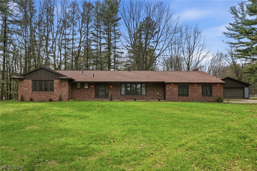 6670 Kepler Road Clinton, OH 44216 - Photo 2 of 49 Four bedroom and three and a half bathrooms ranch style home with a 30 x 50 out building.