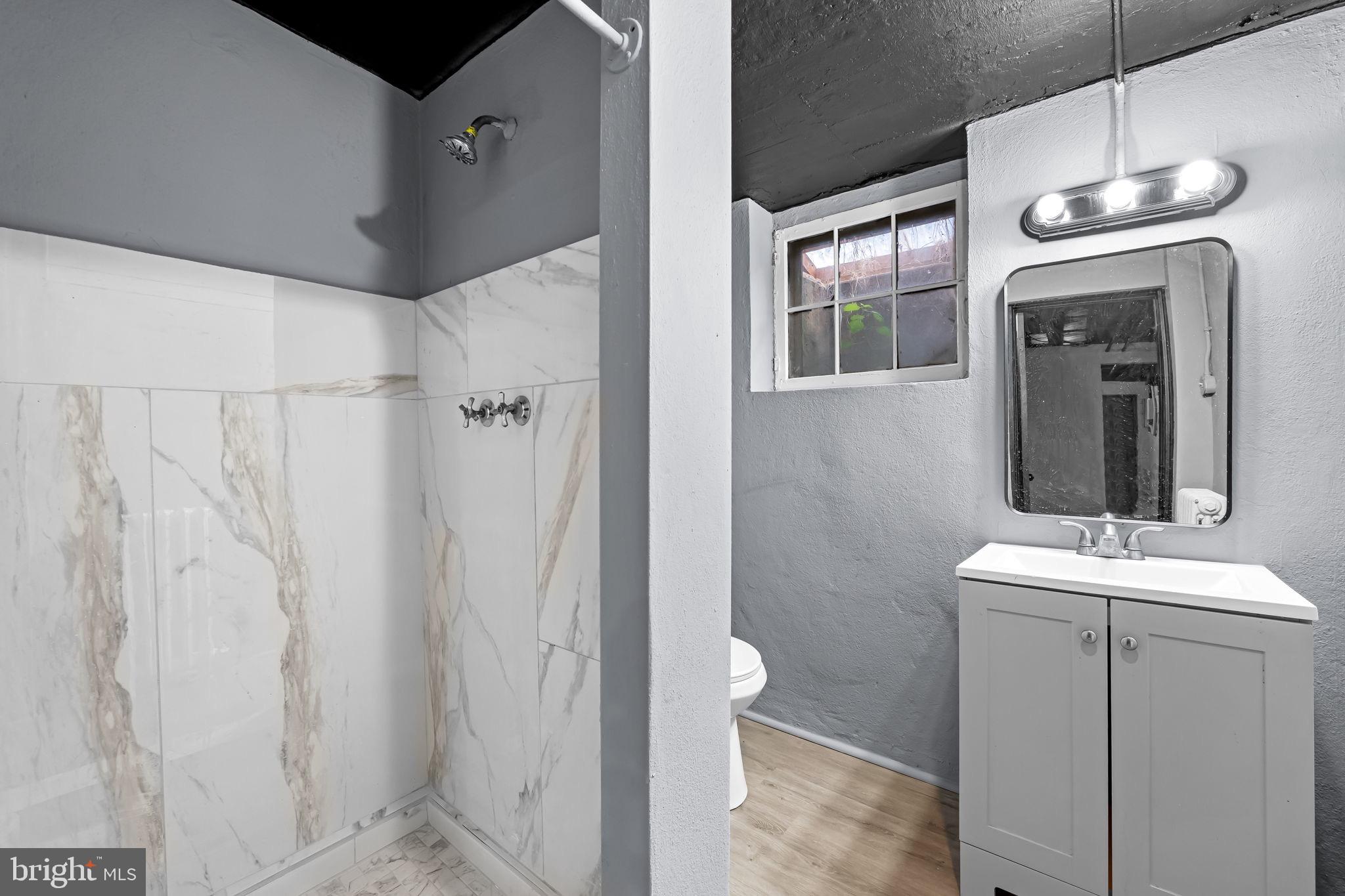 1509 Ralworth Road Baltimore, MD 21218 - Photo 15 of 32 Modern bathroom with sleek finishes.