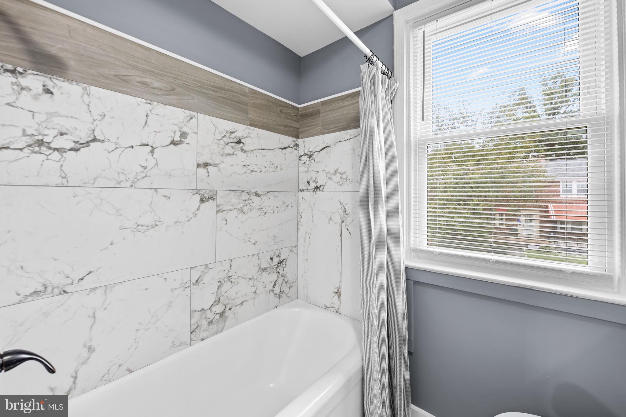 1509 Ralworth Road Baltimore, MD 21218 - Photo 17 of 32 Elegant bathroom with marble accents.