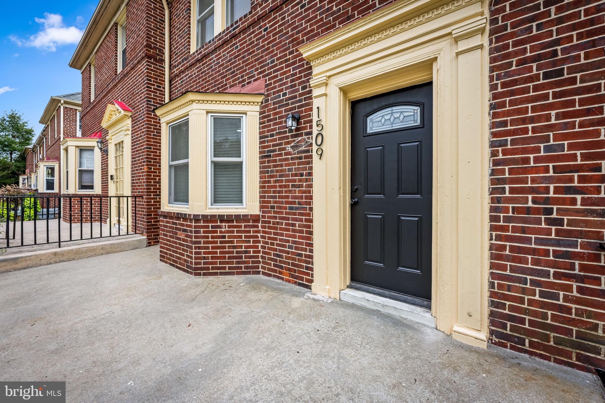 1509 Ralworth Road Baltimore, MD 21218 - Photo 28 of 32 Charming brick facade with modern entrance.