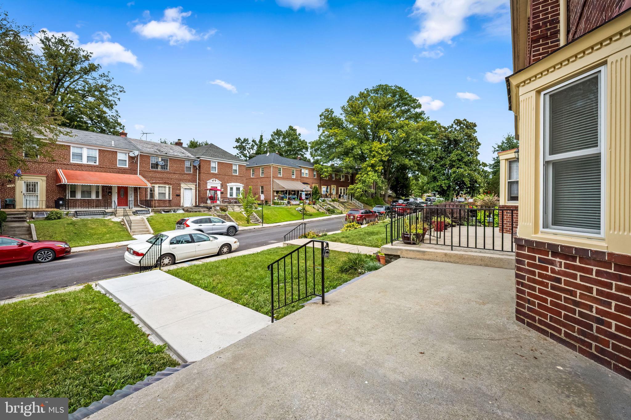 1509 Ralworth Road Baltimore, MD 21218 - Photo 31 of 32 Charming neighborhood with lush greenery.