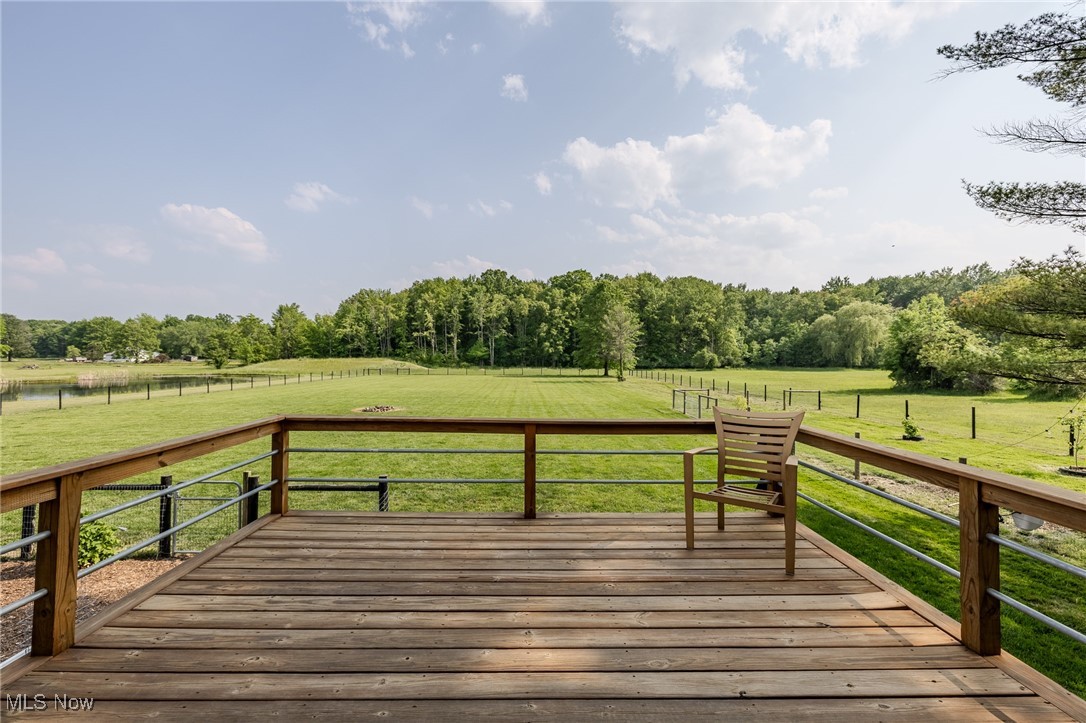 6268 Summers Road Windsor, OH 44099 - Photo 32 of 49 Deck with a rural view and a lawn