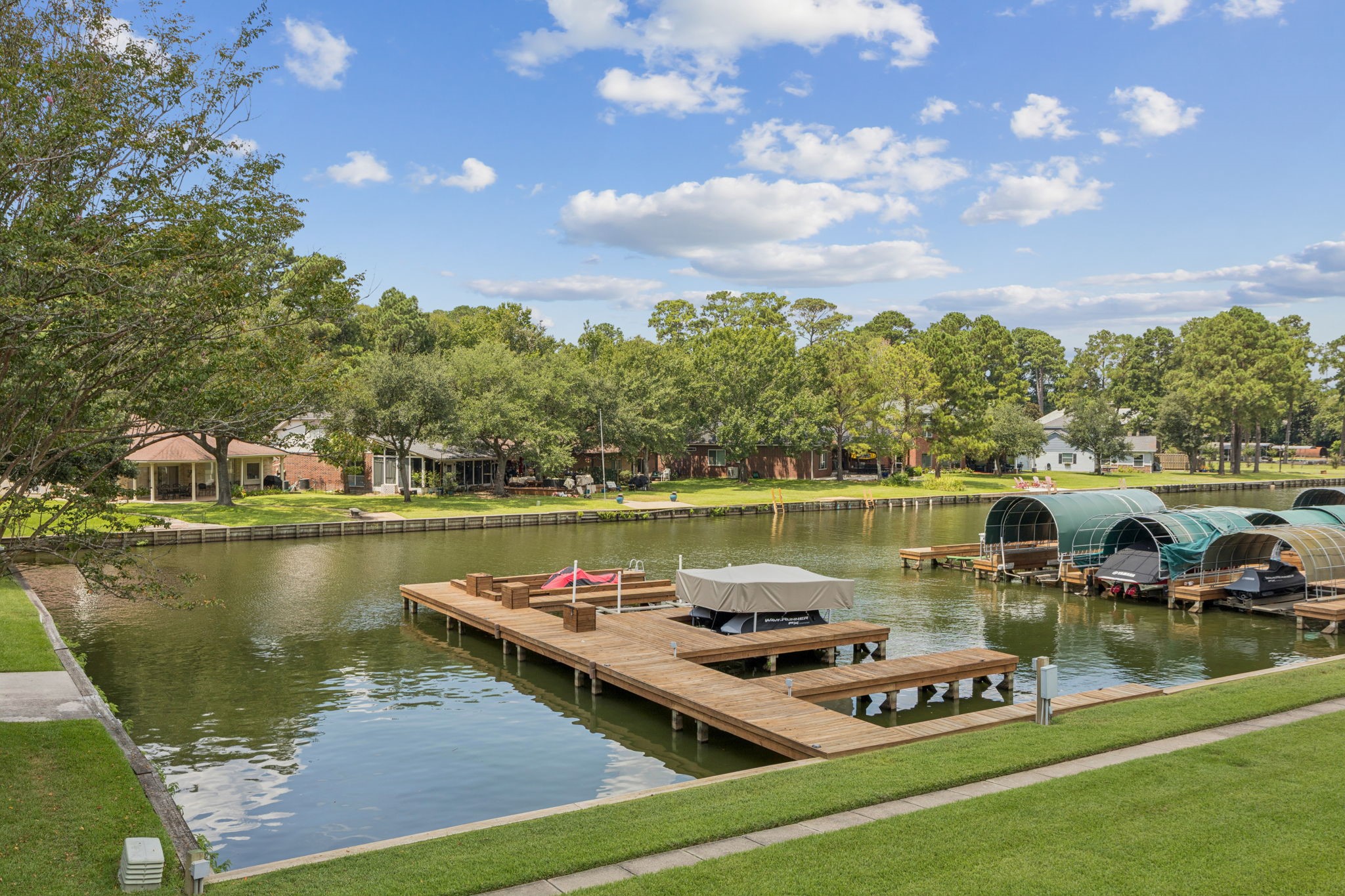 500 River Road, Unit 106 Montgomery, TX 77356 - Photo 6 of 32 a view of a lake with outdoor space