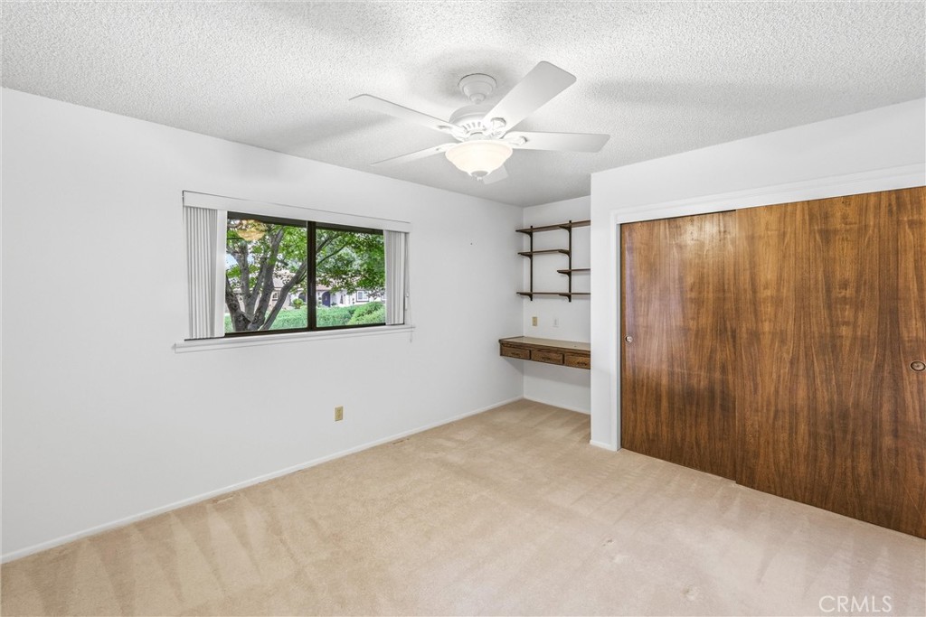 37295 Oak View Road Yucaipa, CA 92399 - Photo 28 of 59 an empty room with windows and fan