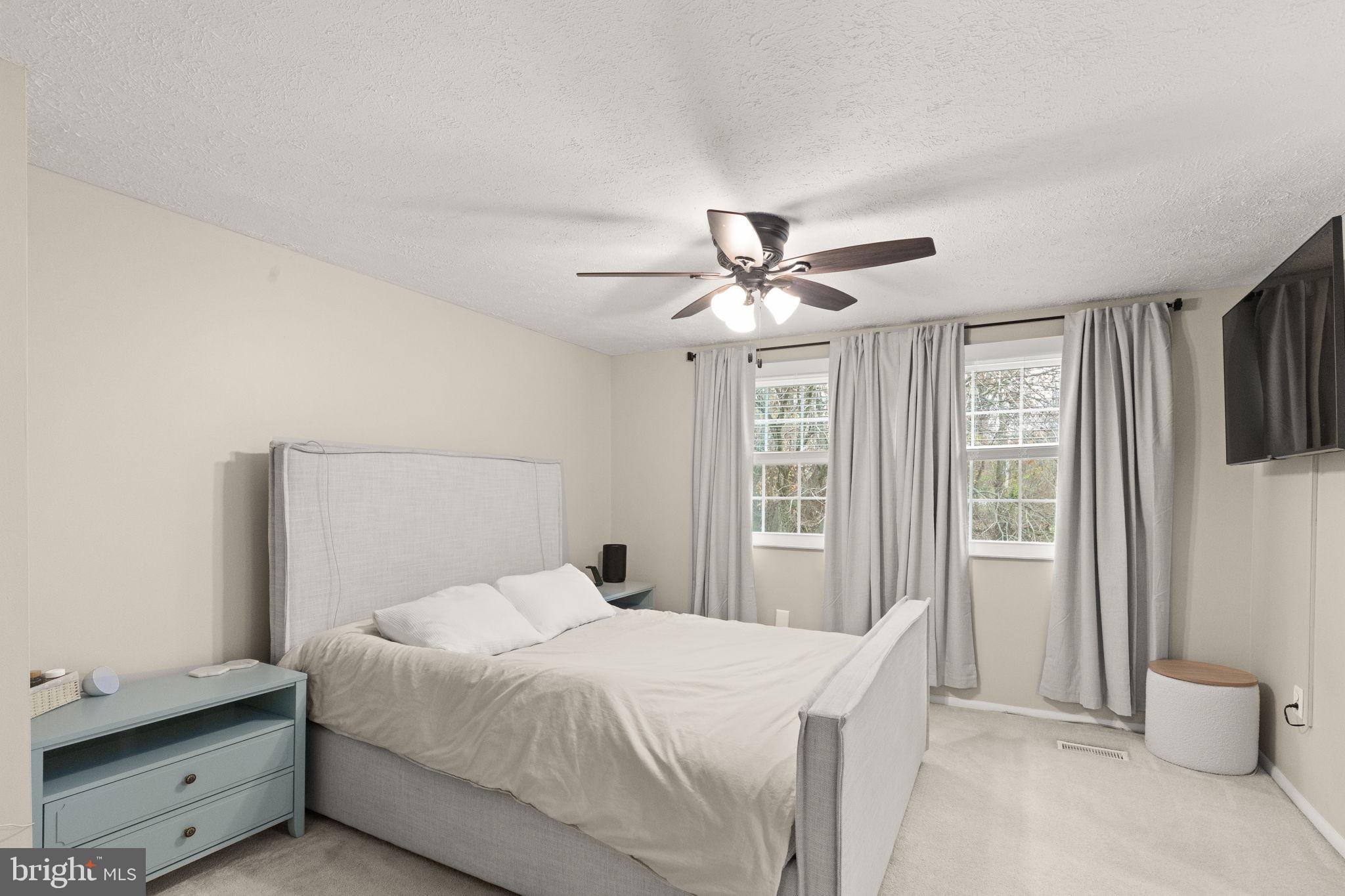 2530 Merrick Court Abingdon, MD 21009 - Photo 14 of 23 a bedroom with a large bed and a window