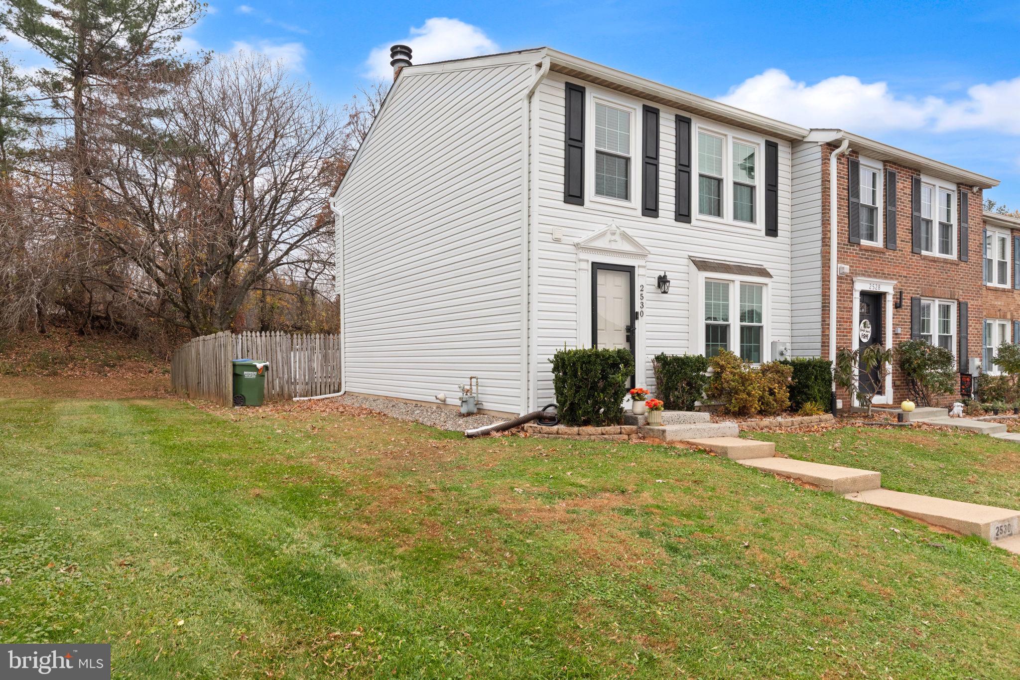 2530 Merrick Court Abingdon, MD 21009 - Photo 2 of 23 a front view of a house with a yard and garage
