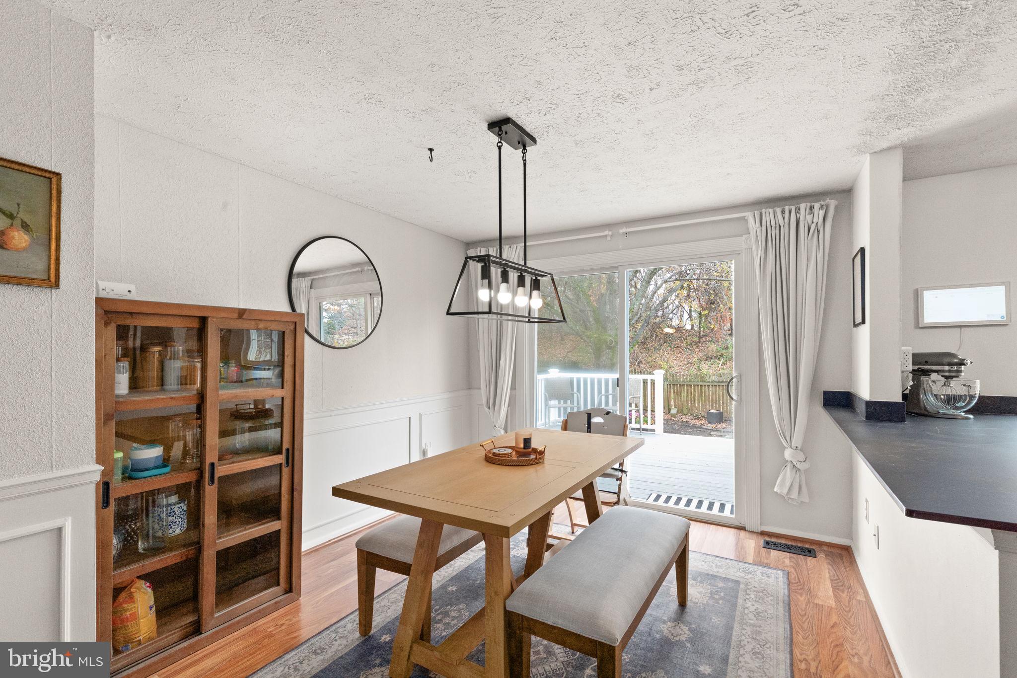 2530 Merrick Court Abingdon, MD 21009 - Photo 7 of 23 a view of a dining room with furniture window and wooden floor