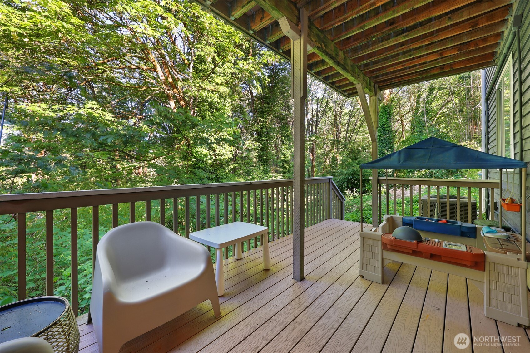 5126 South Garden Loop Road, Unit 11 Seattle, WA 98118 - Photo 29 of 36 a view of a deck
