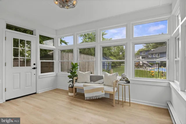 a living room with furniture and windows