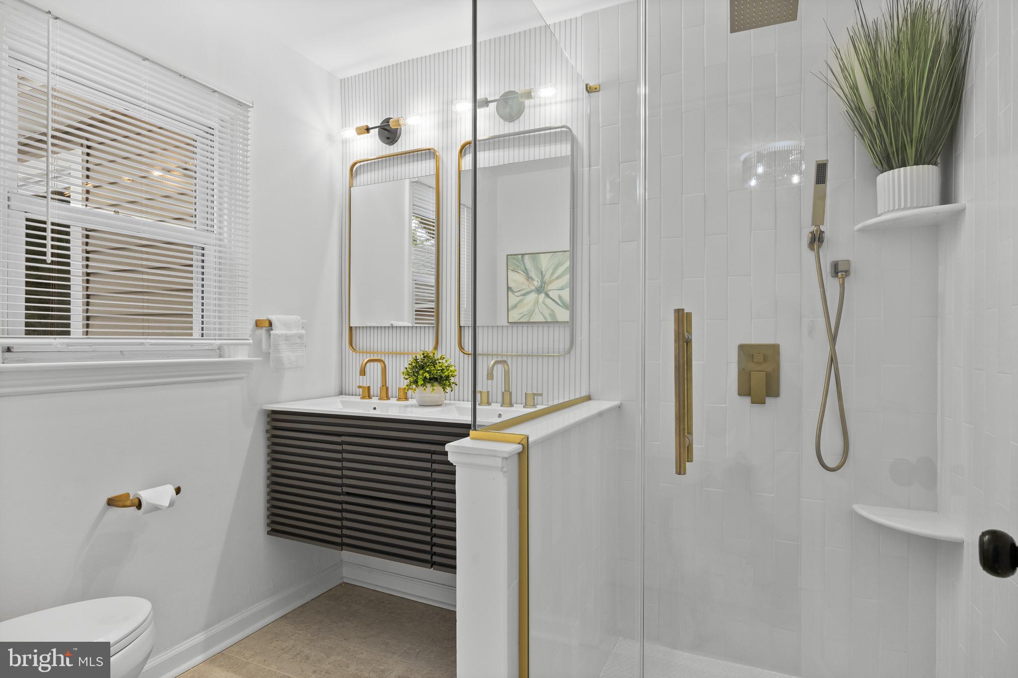 11 East Sutton Avenue Moorestown, NJ 08057 - Photo 15 of 27 a bathroom with a sink a toilet and shower