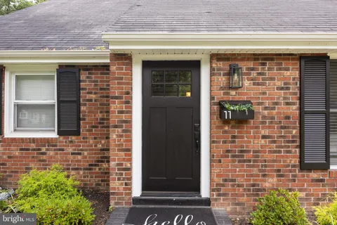a front view of a house with a shower