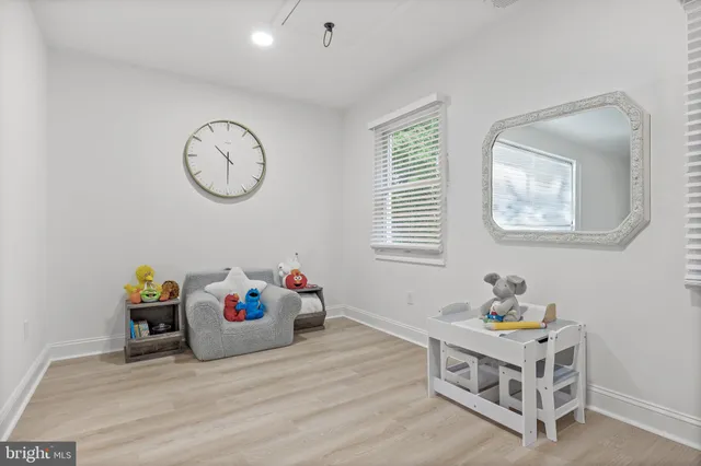 a bed room with a bed and a window