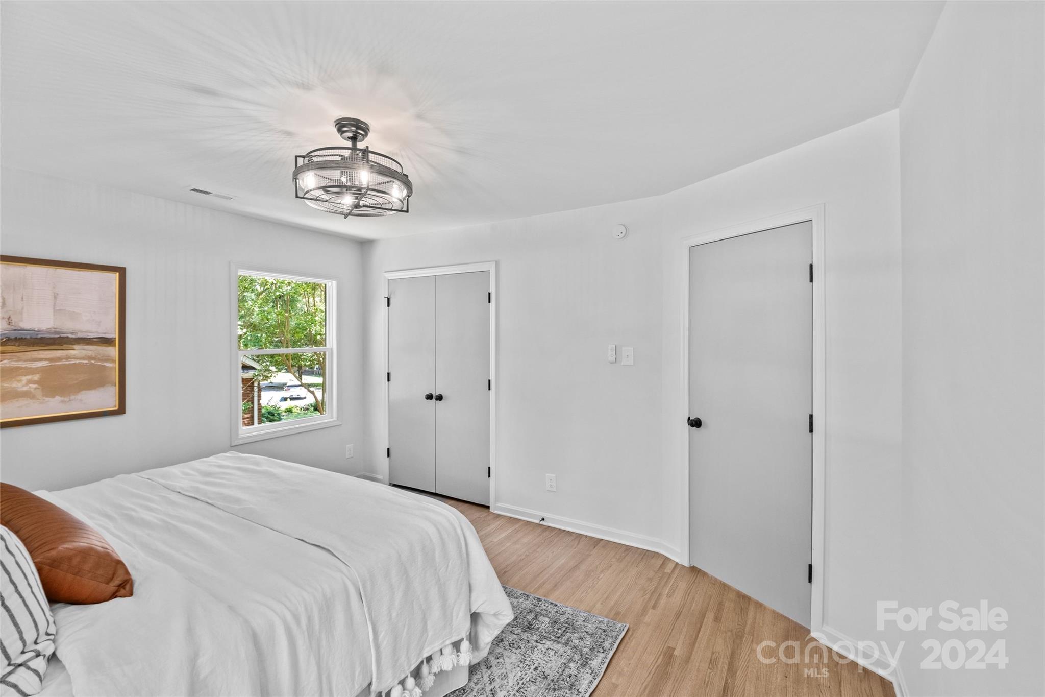 5807 Ruth Drive Charlotte, NC 28215 - Photo 18 of 41 a bedroom with a bed and a window