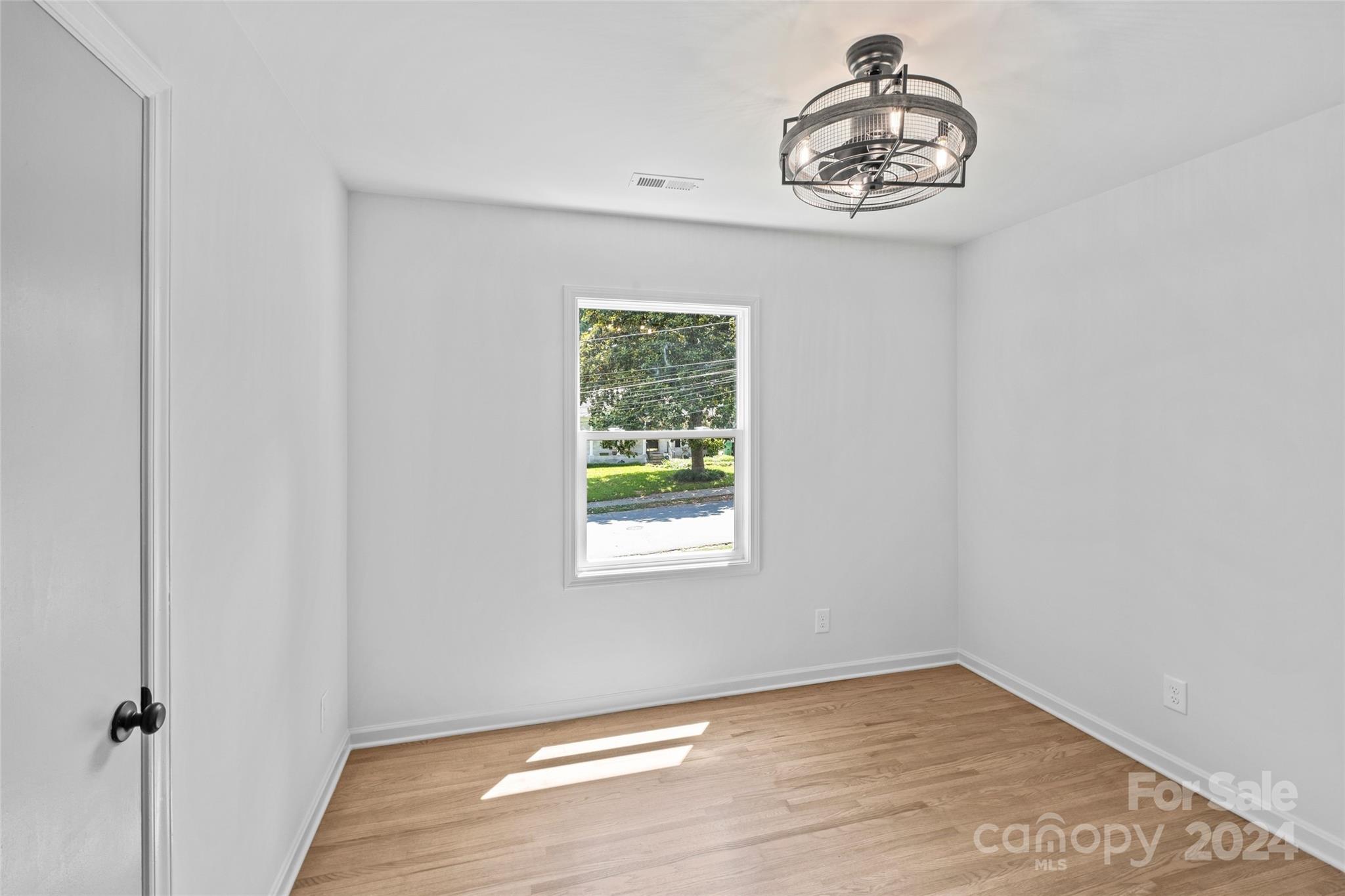 5807 Ruth Drive Charlotte, NC 28215 - Photo 21 of 41 an empty room with a window
