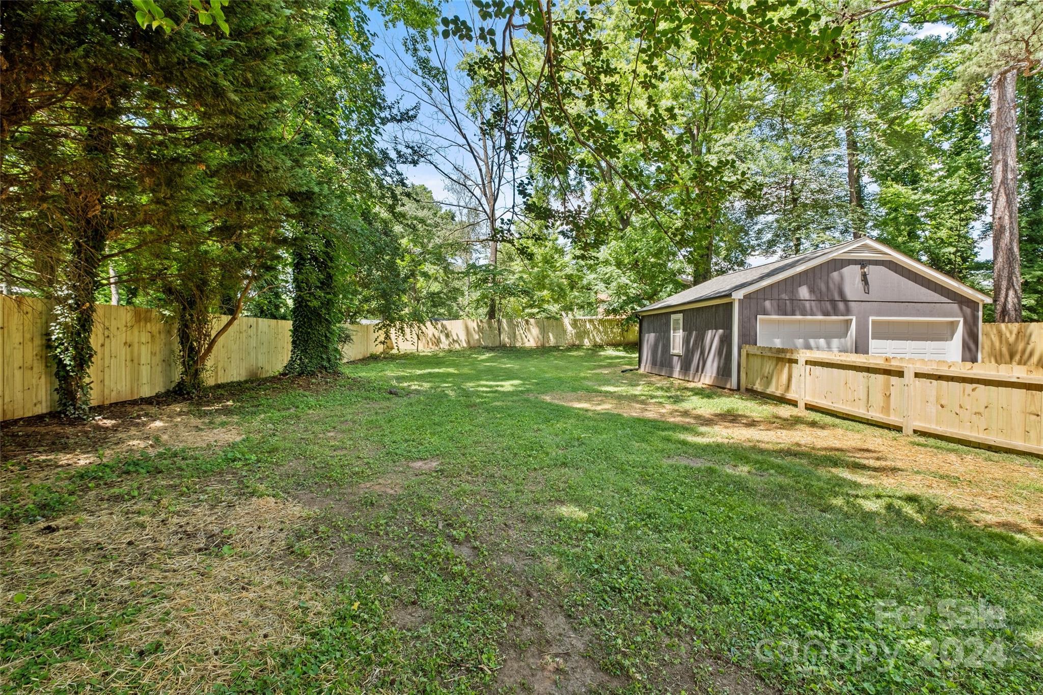 5807 Ruth Drive Charlotte, NC 28215 - Photo 36 of 41 a house view with a garden space