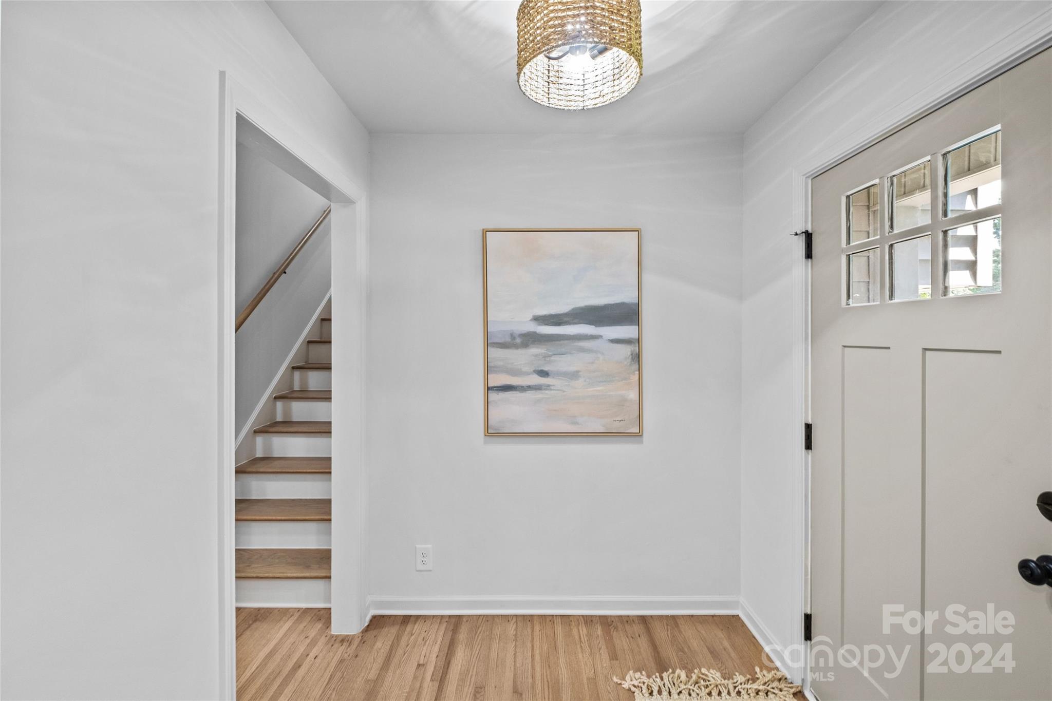5807 Ruth Drive Charlotte, NC 28215 - Photo 5 of 41 a view of an empty room and wooden floor