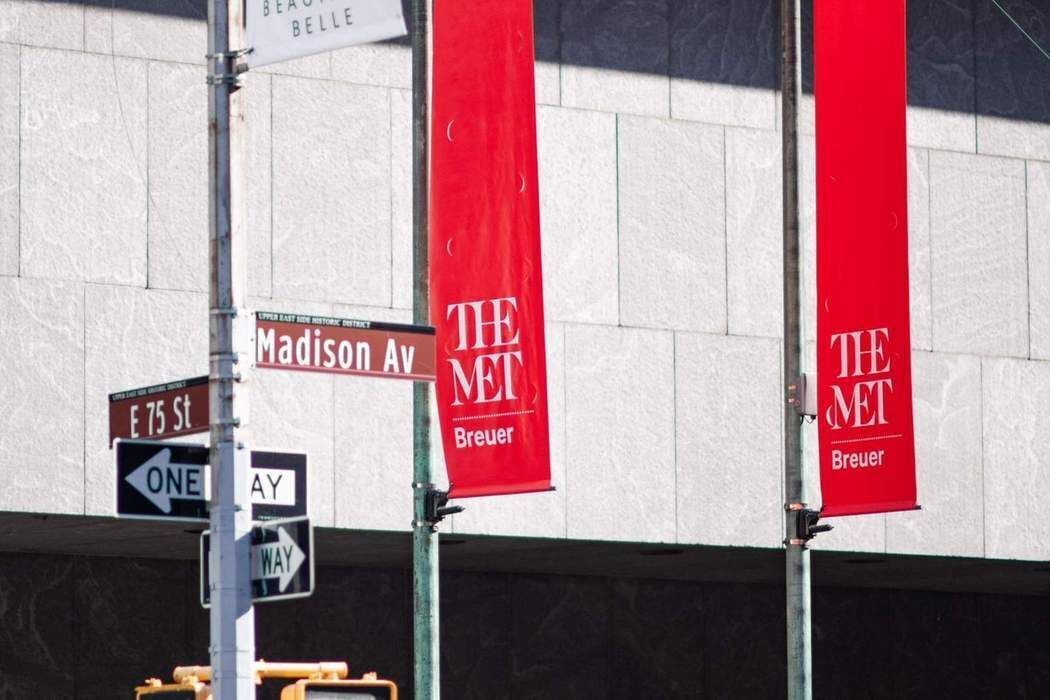 930 5th Avenue, Unit 7B Manhattan, NY 10021 - Photo 13 of 15 a street sign on a pole on a street