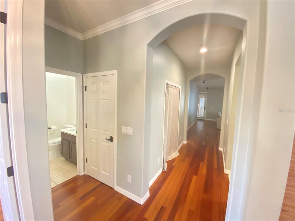 8763 Coco Plum Place Orlando, FL 32827 - Photo 4 of 26 a bathroom with a sink and a mirror