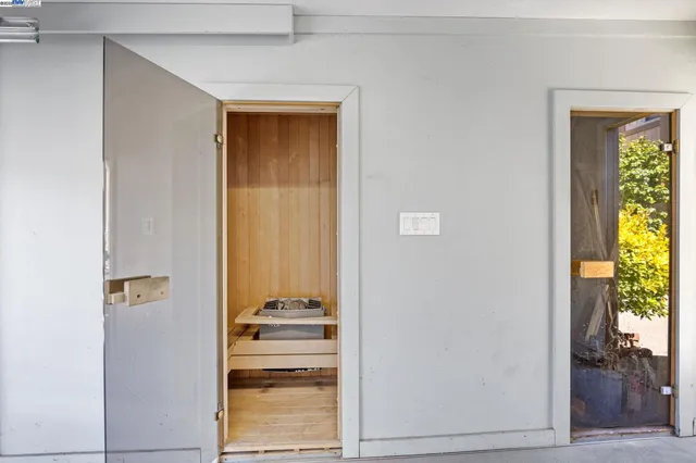 a view of front door with wooden floor