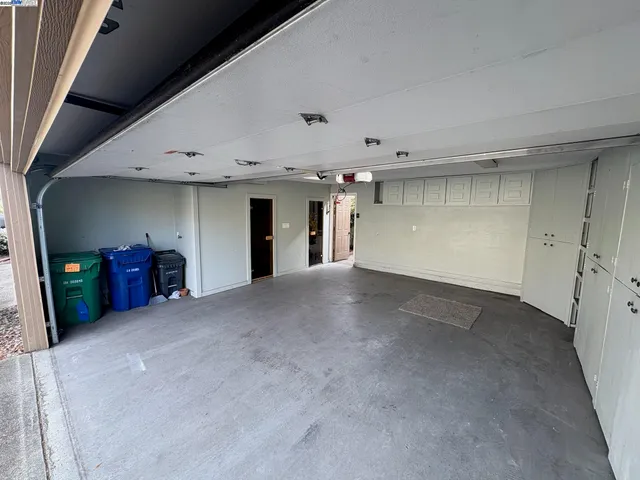 a view of a big room with closet and cabinet
