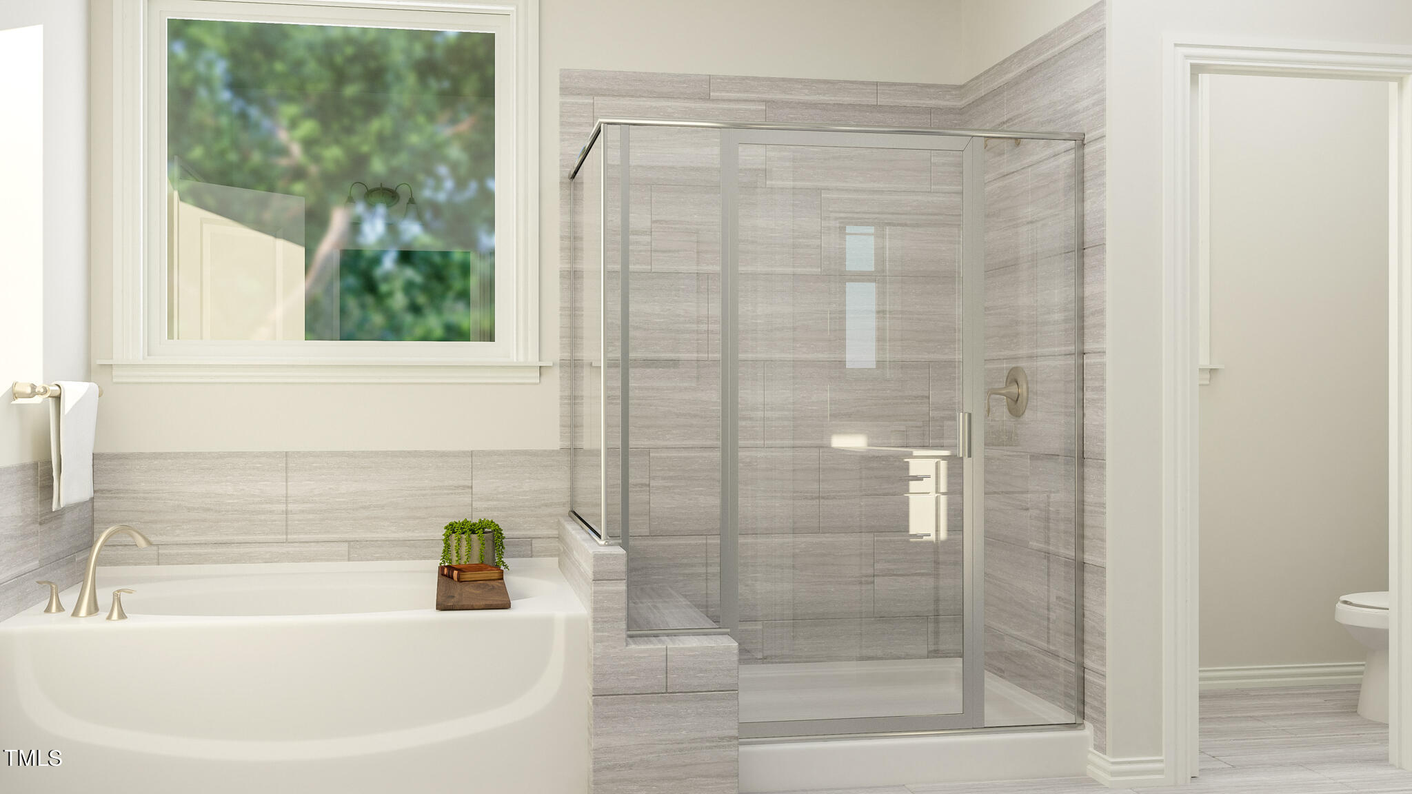 961 Jasper Mine Trail Raleigh, NC 27610 - Photo 24 of 38 a bathroom with a bathtub and a shower