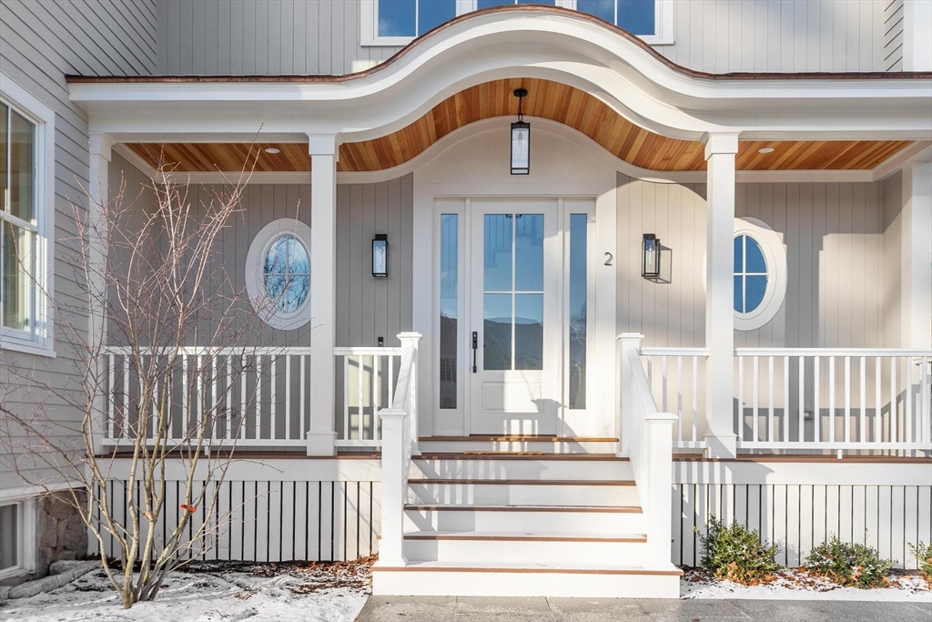 2 Beech Tree Lane Lexington, MA 02421 - Photo 2 of 18 a front view of a house with a glass door