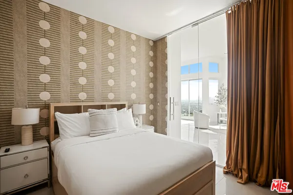 a bathroom with a bathtub and a sink