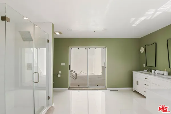 a view of balcony with furniture