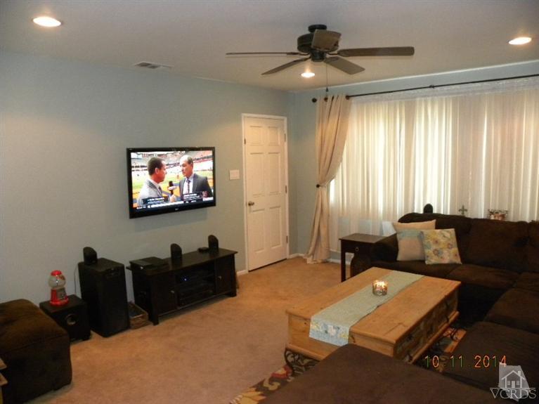 4192 Cochran Street Simi Valley, CA 93063 - Photo 3 of 17 a living room with furniture and a flat screen tv