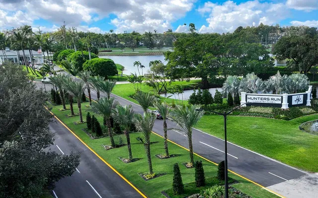 a view of a garden with sitting area