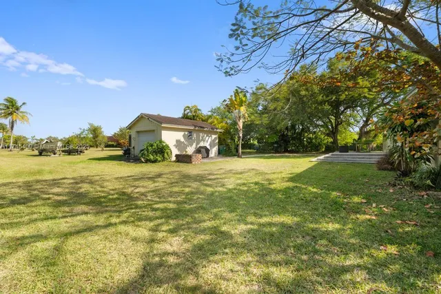 a view of outdoor space yard and swimming pool