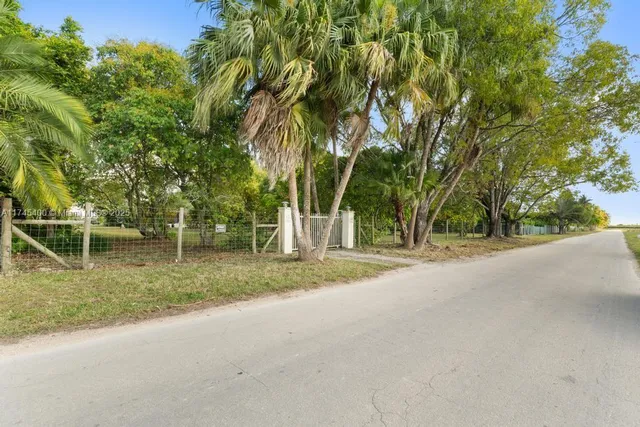 a view of outdoor space with deck and yard