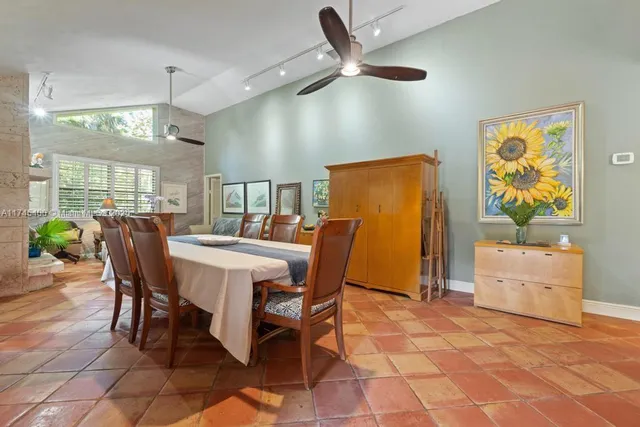 a view of a dining room with furniture