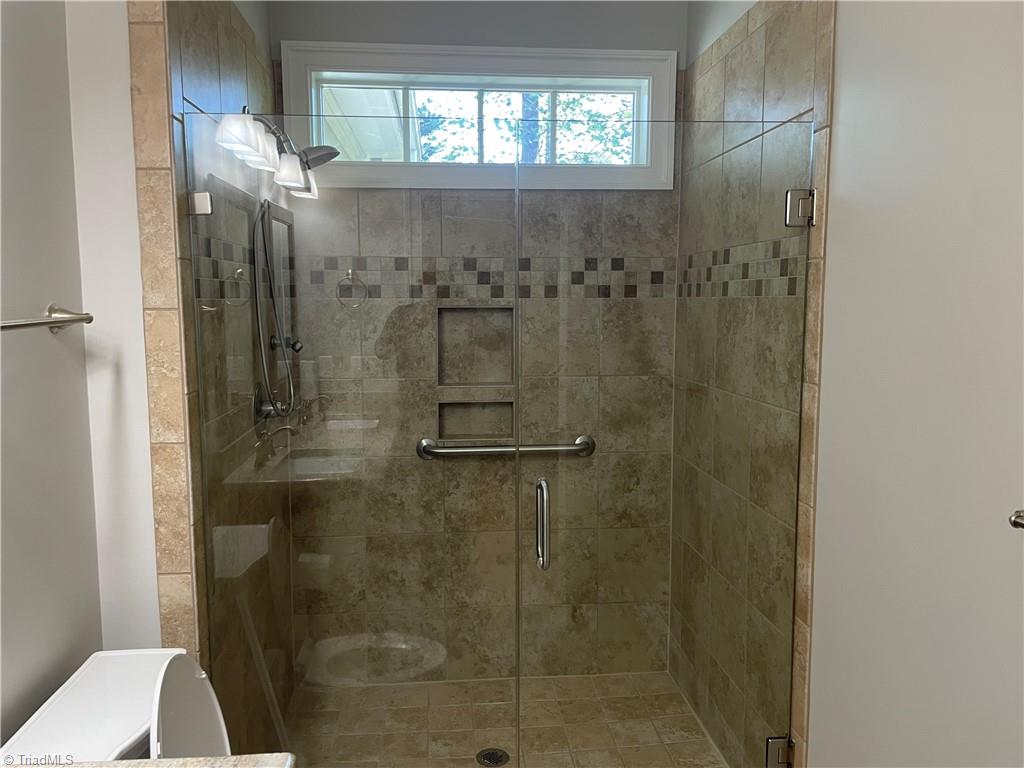 9012 Ray Road Raleigh, NC 27613 - Photo 16 of 42 Hall bathroom #2 - Pic 3; walk-in shower; serves bedroom 3 and 4