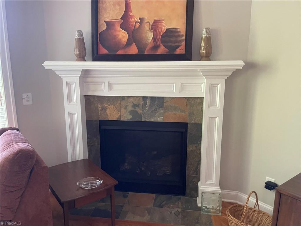 9012 Ray Road Raleigh, NC 27613 - Photo 20 of 42 Den fireplace