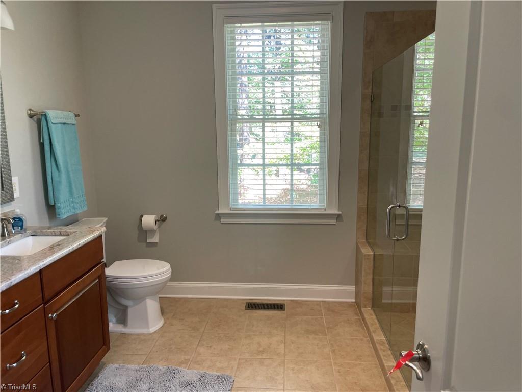 9012 Ray Road Raleigh, NC 27613 - Photo 5 of 42 Primary Bedroom Bath Pic 1