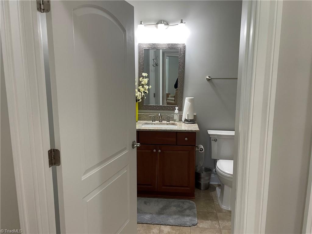 9012 Ray Road Raleigh, NC 27613 - Photo 10 of 42 Entry to Hall Bath #1