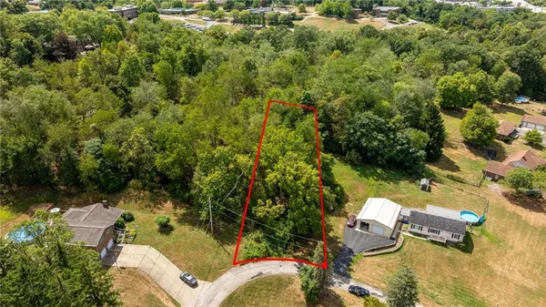 an aerial view of residential house with outdoor space