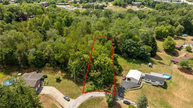 an aerial view of residential house with outdoor space