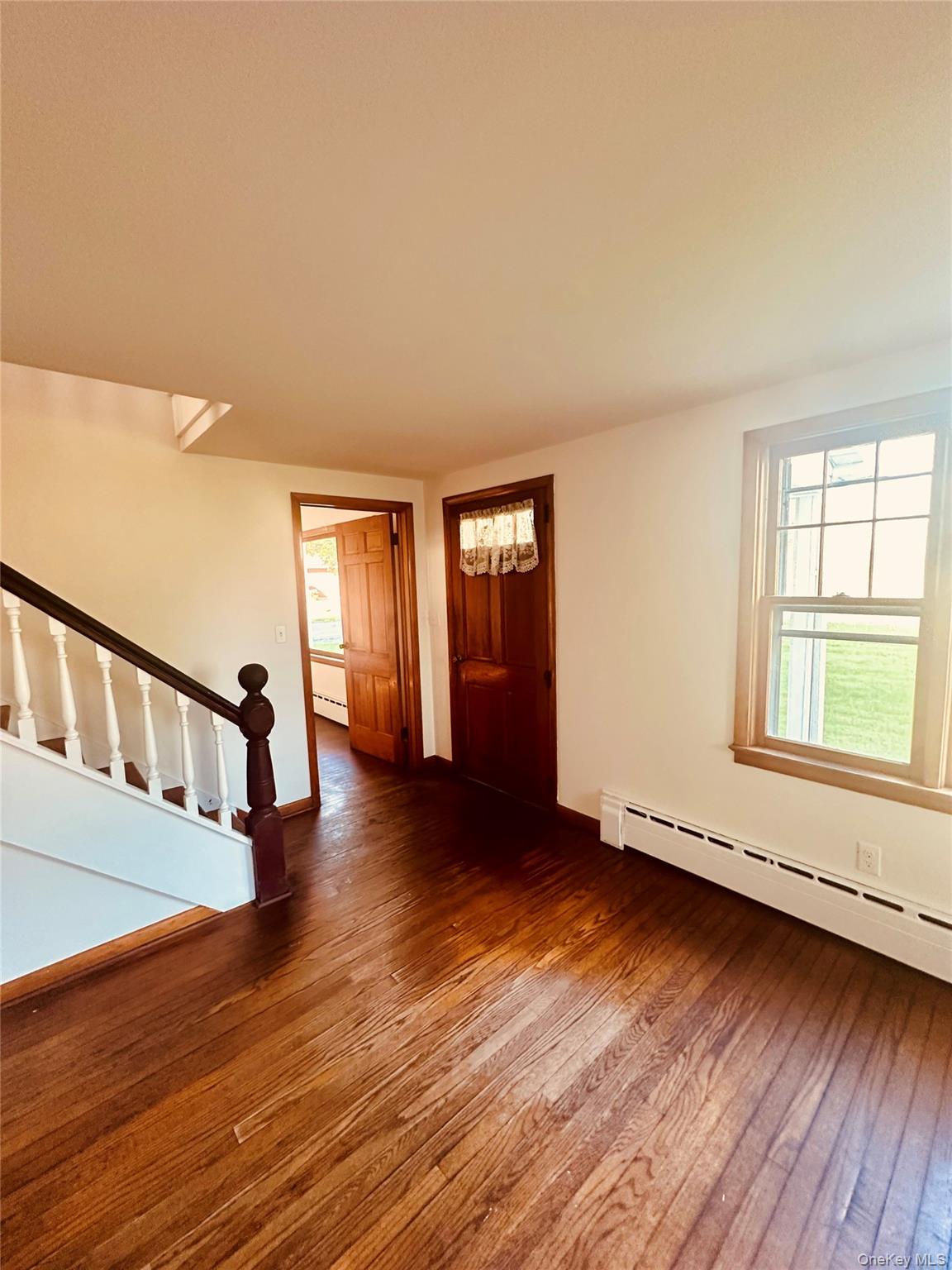 3 Indiana Road Goshen, NY 10924 - Photo 2 of 13 Hardwood floors and stairs to the second level