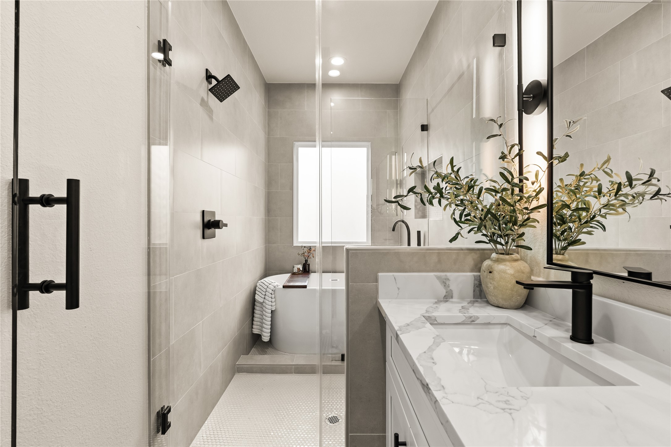 3539 Mainer Street, Unit B Houston, TX 77021 - Photo 18 of 29 Primary bath featuring a frameless glass shower and a soaking tub — your own personal spa