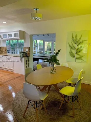 a kitchen with stainless steel appliances a stove and a refrigerator