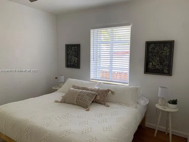 a bathroom with a sink and a window
