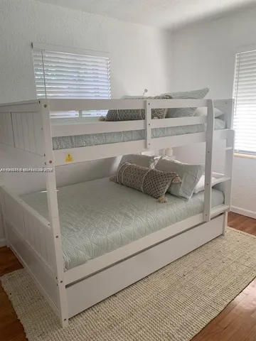 a bathroom with a bathtub and a sink
