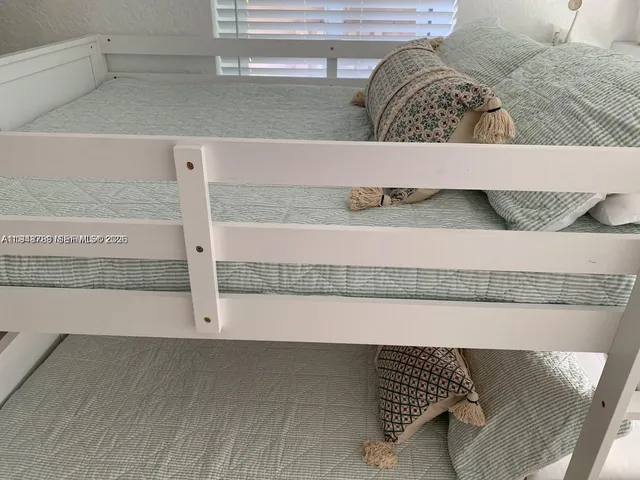 a bathroom with a bathtub and a sink