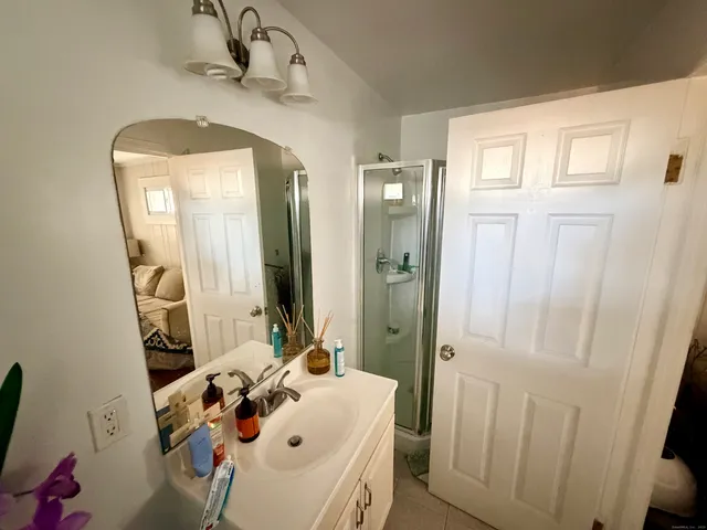 a bed room with a bed and a couch