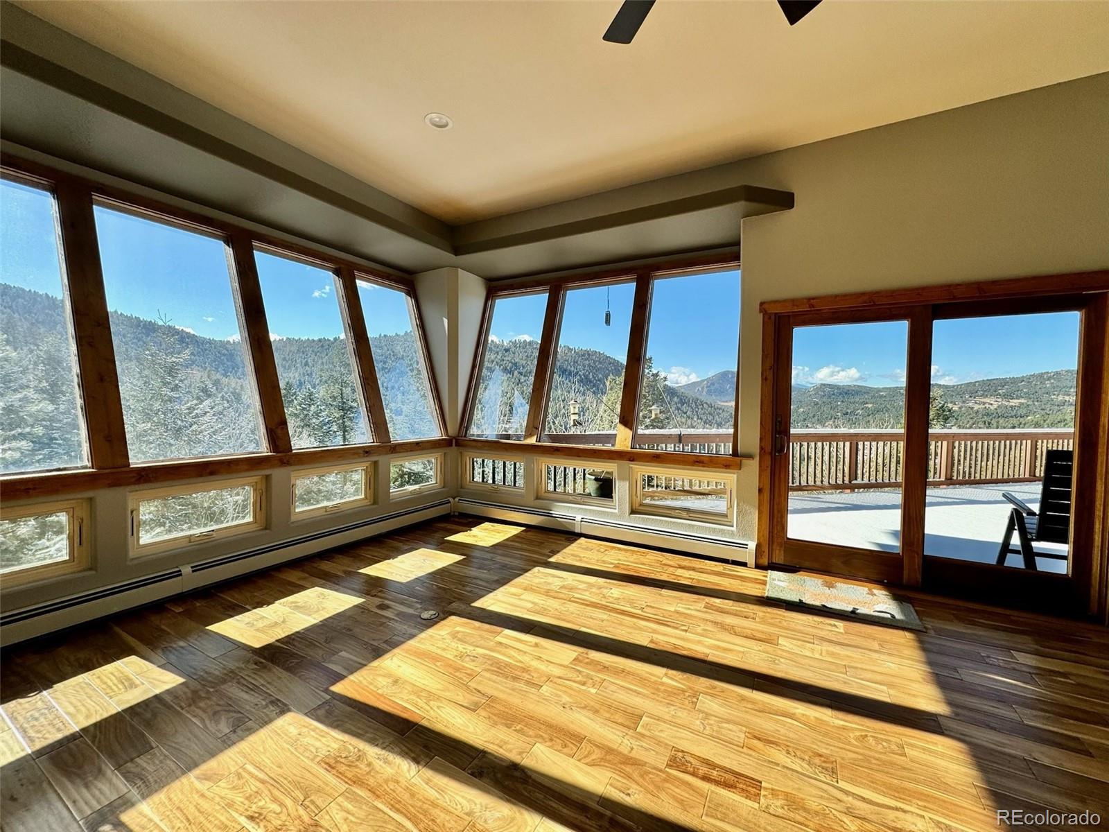20670 Rangeview Drive Morrison, CO 80465 - Photo 19 of 39 a view of a balcony with swimming pool