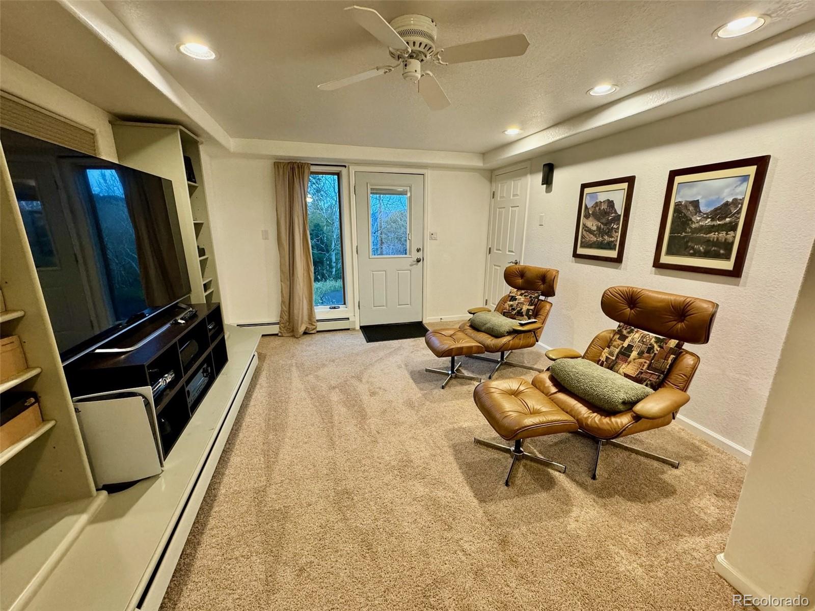 20670 Rangeview Drive Morrison, CO 80465 - Photo 26 of 39 a living room with furniture